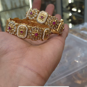 Exquisite Gold-Toned Bangles with Ruby and Pearl Accents